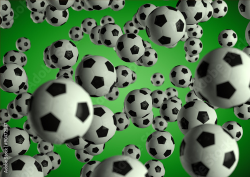 Soccer footballs flying through the air on moody green backgroun