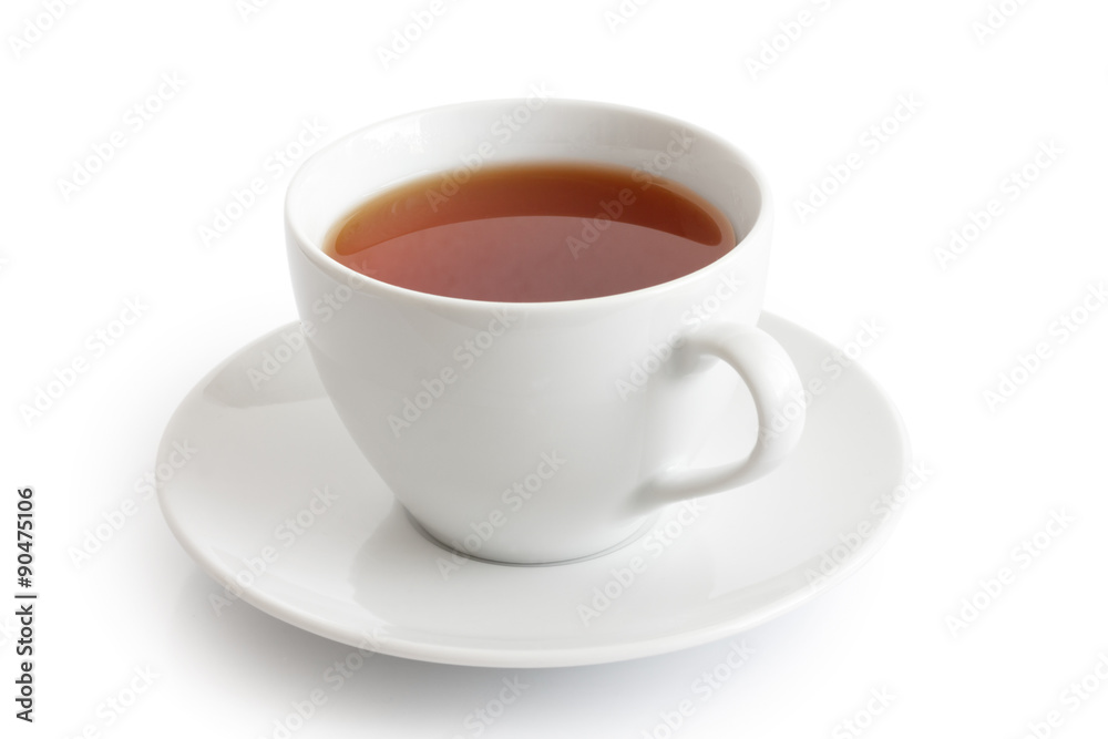 White ceramic cup and saucer with rooibos tea. Isolated. White ceramic cup and saucer with rooibos tea. Isolated.