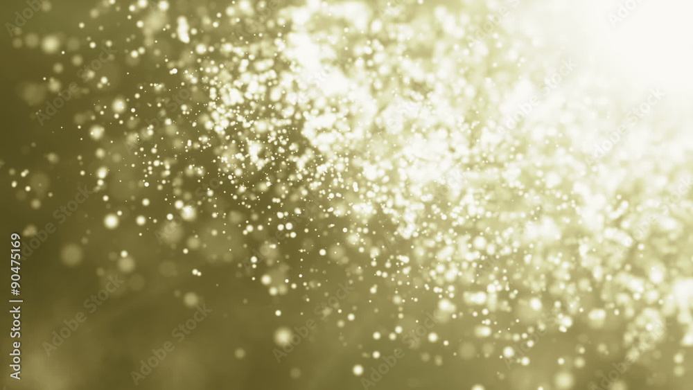Golden particles falling. Seamless loop