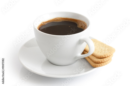 White ceramic cup and saucer with black coffee and finger biscui