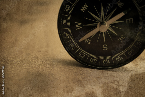 compass in vintage style on mulberry paper texture
 photo