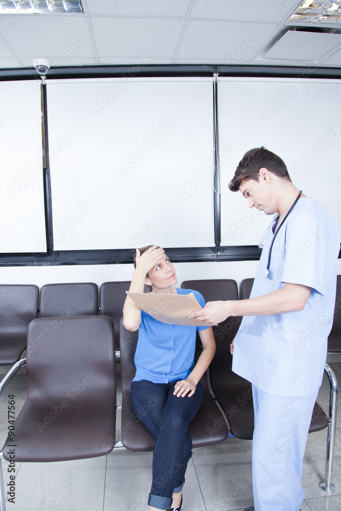 Fototapeta premium Male nurse helping a woman