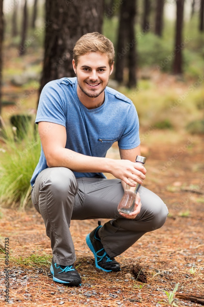 Portrait of a handsome man holding a water bottle Portrait of a handsome man holding a water bottle