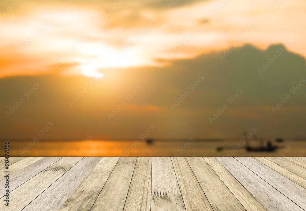 perspective wood plank floor or walk way on over blur sea above sunset background perspective wood plank floor or walk way on over blur sea above sunset background