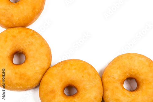 fried equal round doughnuts in frame