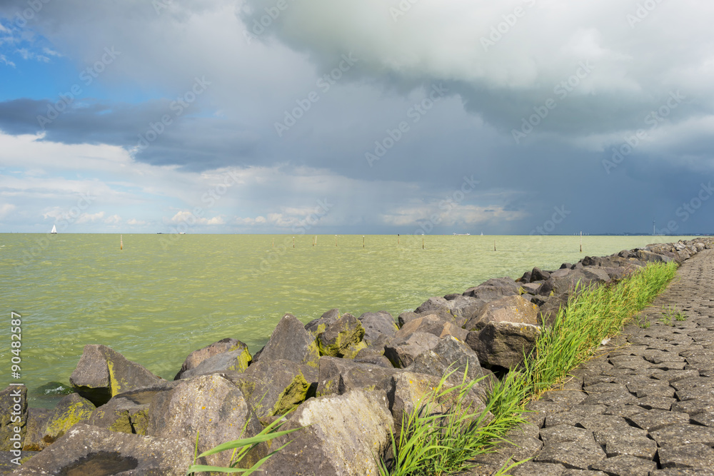 Deteriorating weather above a lake in summer Deteriorating weather above a lake in summer