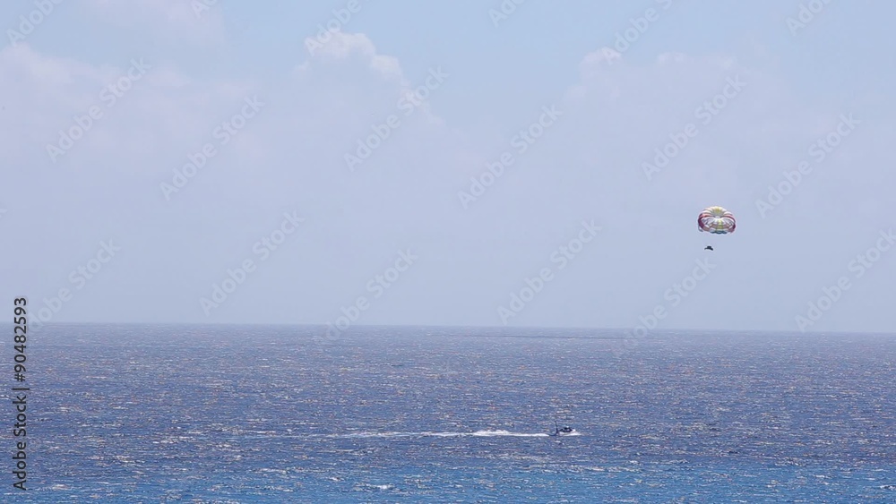 Parasailing From Boat in caribbean sea at Cancun
Parasailing From Boat in caribbean sea at Cancun
