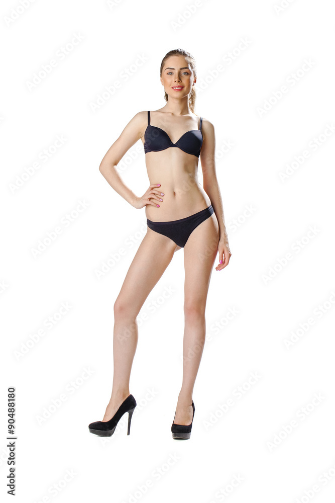 Full length portrait of a beautiful young model in black bikini Full length portrait of a beautiful young model in black bikini