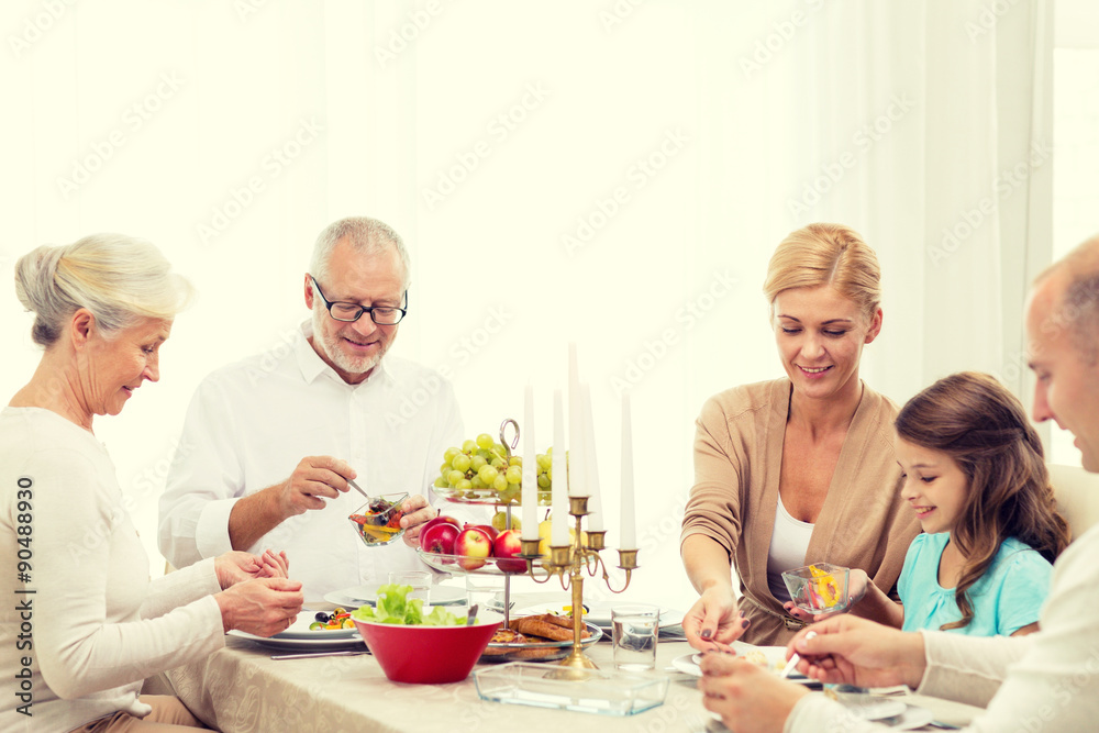 smiling family having holiday dinner at home smiling family having holiday dinner at home