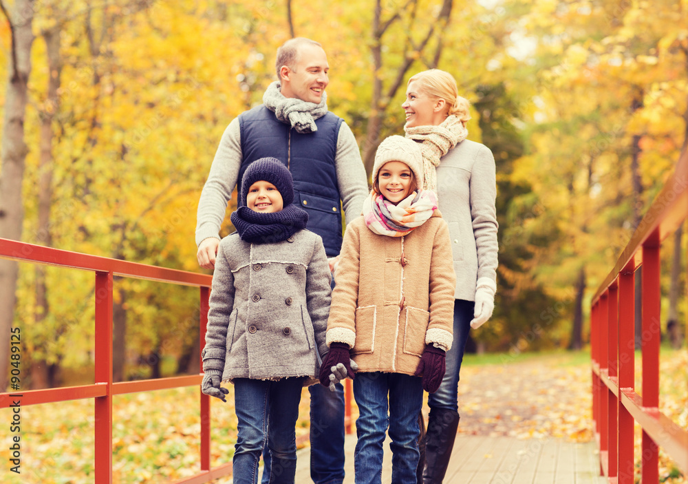 Fototapeta premium happy family in autumn park