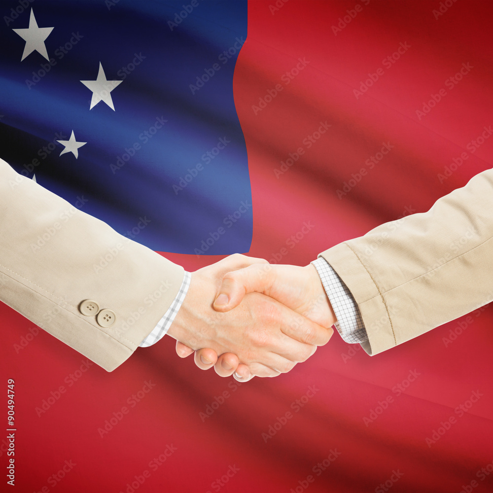 Businessmen handshake with flag on background - Samoa