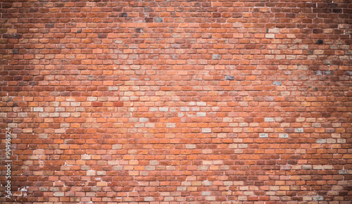 Vintage red brick wall photo
