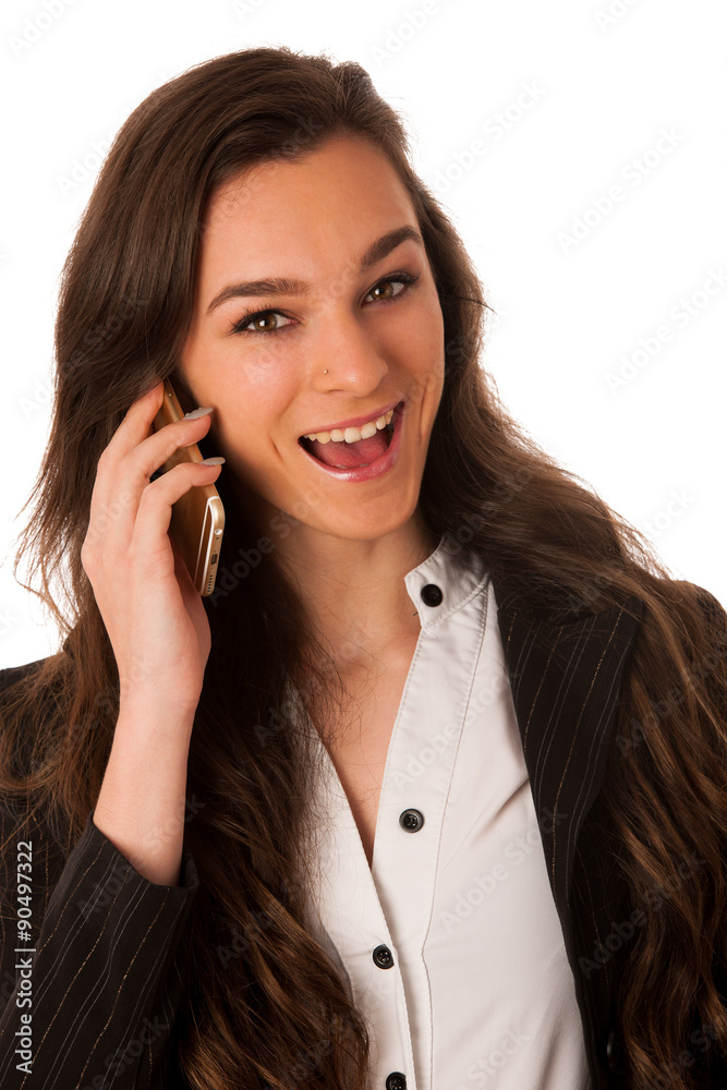 Beautiful young woman speaking on a cell phone isolated over whi Beautiful young woman speaking on a cell phone isolated over whi