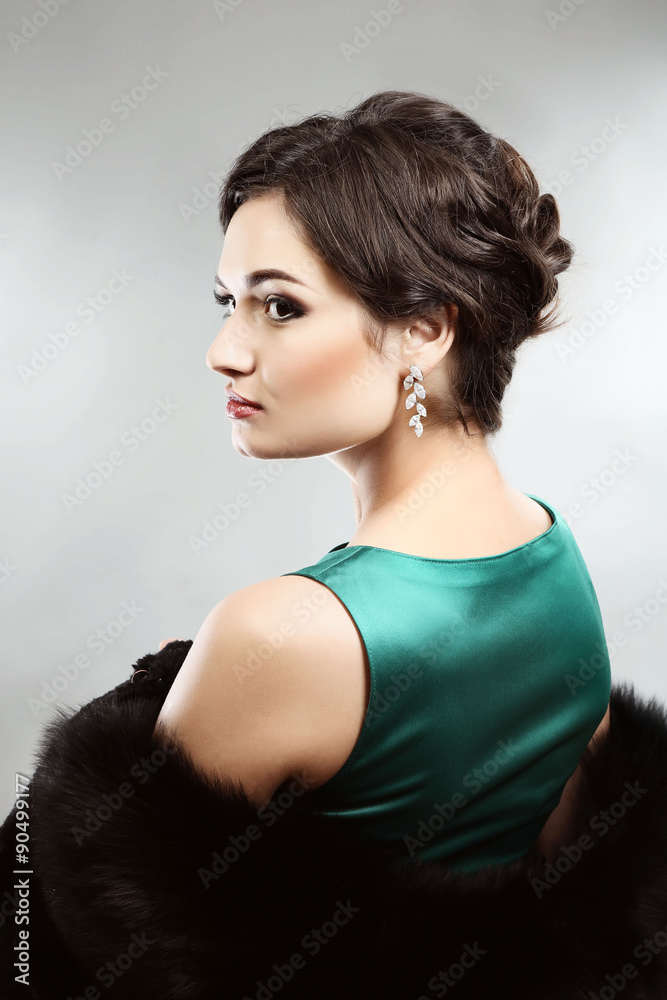 Retro style portrait of young woman on light background Retro style portrait of young woman on light background