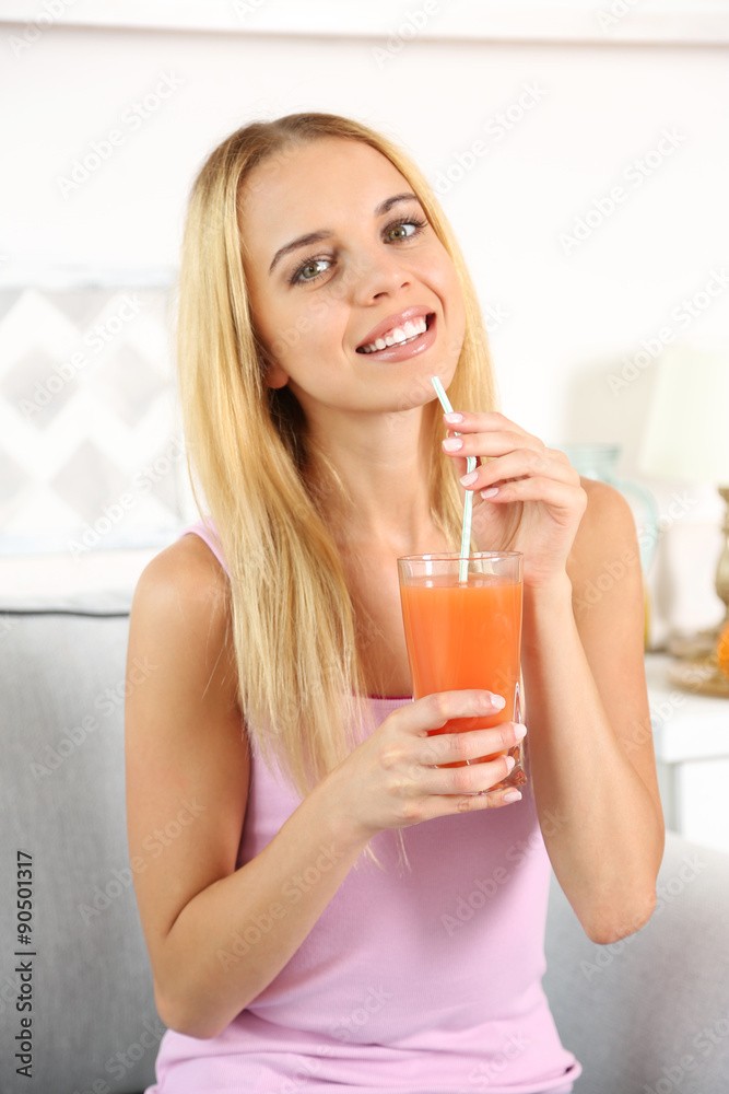 Young beautiful woman drinking fresh juice Young beautiful woman drinking fresh juice