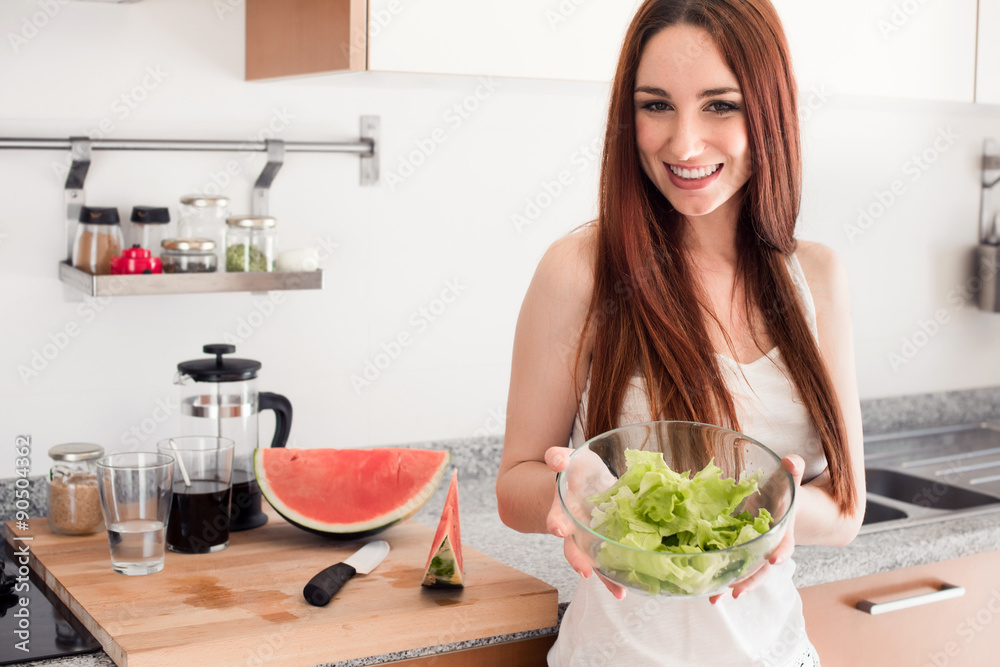 Healthy woman in Kitchen