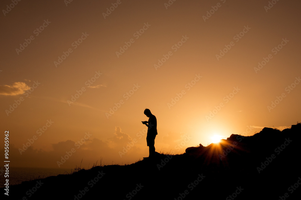 Silhouette of man at mountion