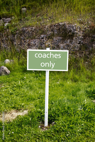 Coach only parking sign