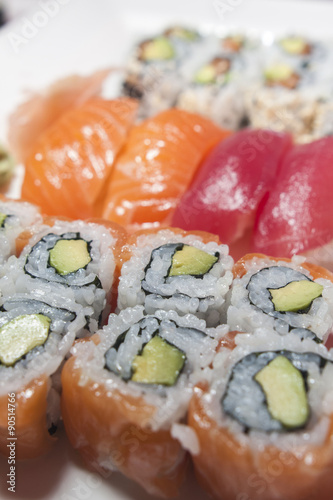 salmon and tuna sushi and california rolls