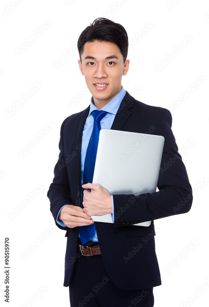 Young businessman hold with notebook computer Young businessman hold with notebook computer