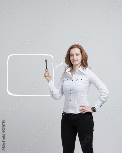 woman writes in a painted  speech cloud photo