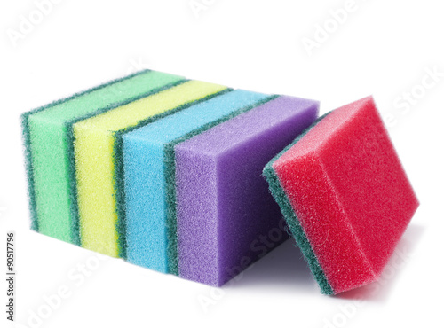 Stack of cleaning sponges on a white background