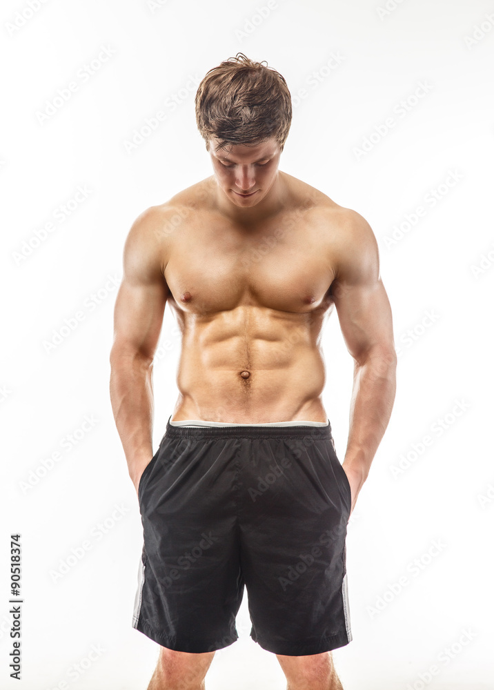 Young muscular guy in black shorts.