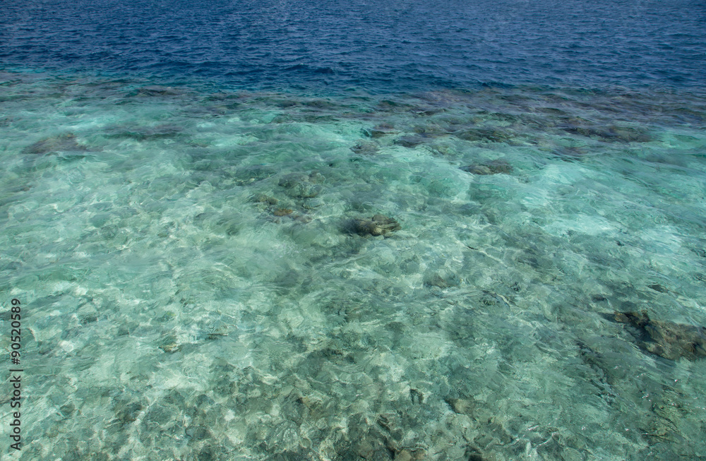 Transparent water of the Indian ocean on a clear day