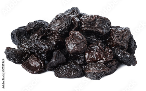 Dried prunes on a white background