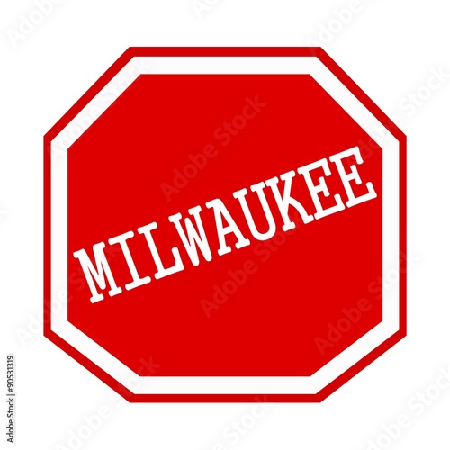 MILWAUKEE white stamp text on red octagon photo