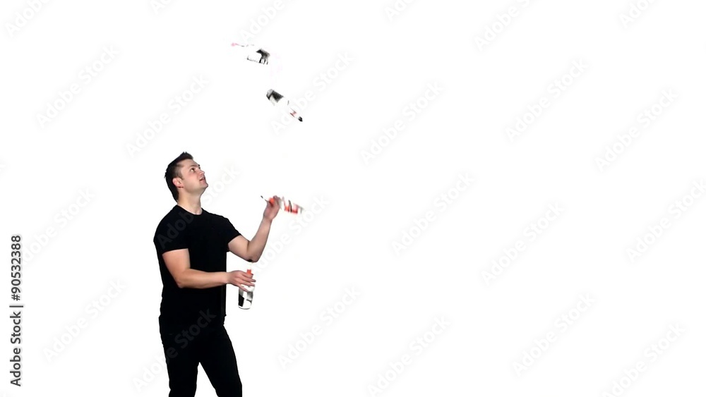 silhouette of barman showing tricks with a bottle silhouette of barman showing tricks with a bottle