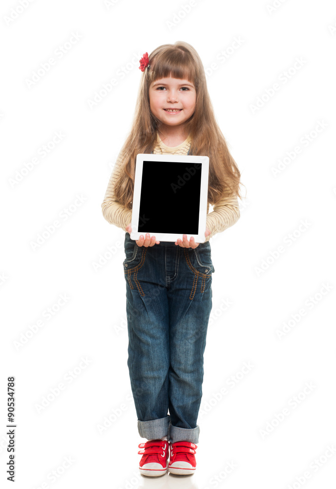 cute little girl wearing jeans overall posing in studio with whi cute little girl wearing jeans overall posing in studio with whi