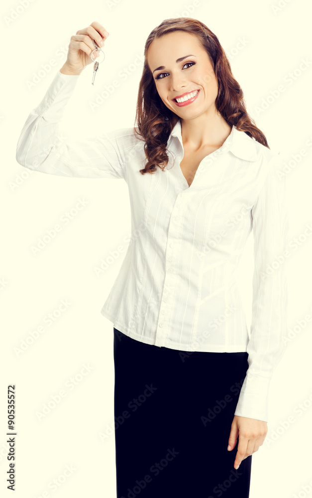 Businesswoman or real estate agent with keys Businesswoman or real estate agent with keys