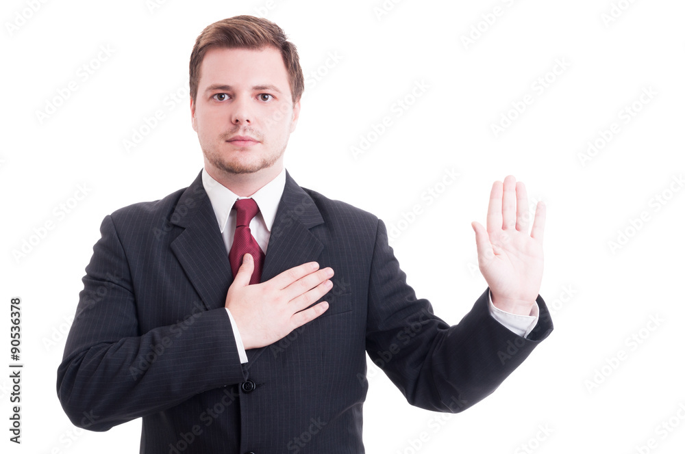 Young lawyer making oath or swearing gesture Young lawyer making oath or swearing gesture