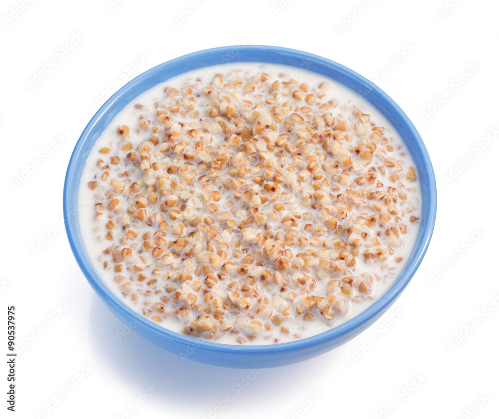 buckwheat in bowl isolated on white buckwheat in bowl isolated on white