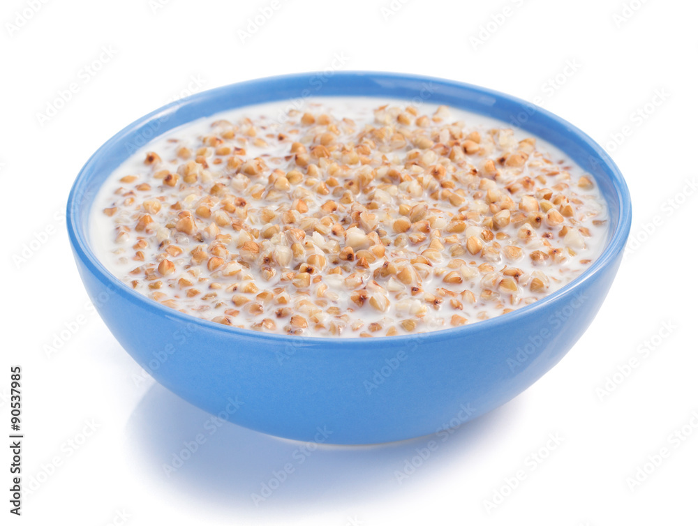 buckwheat in bowl isolated on white buckwheat in bowl isolated on white