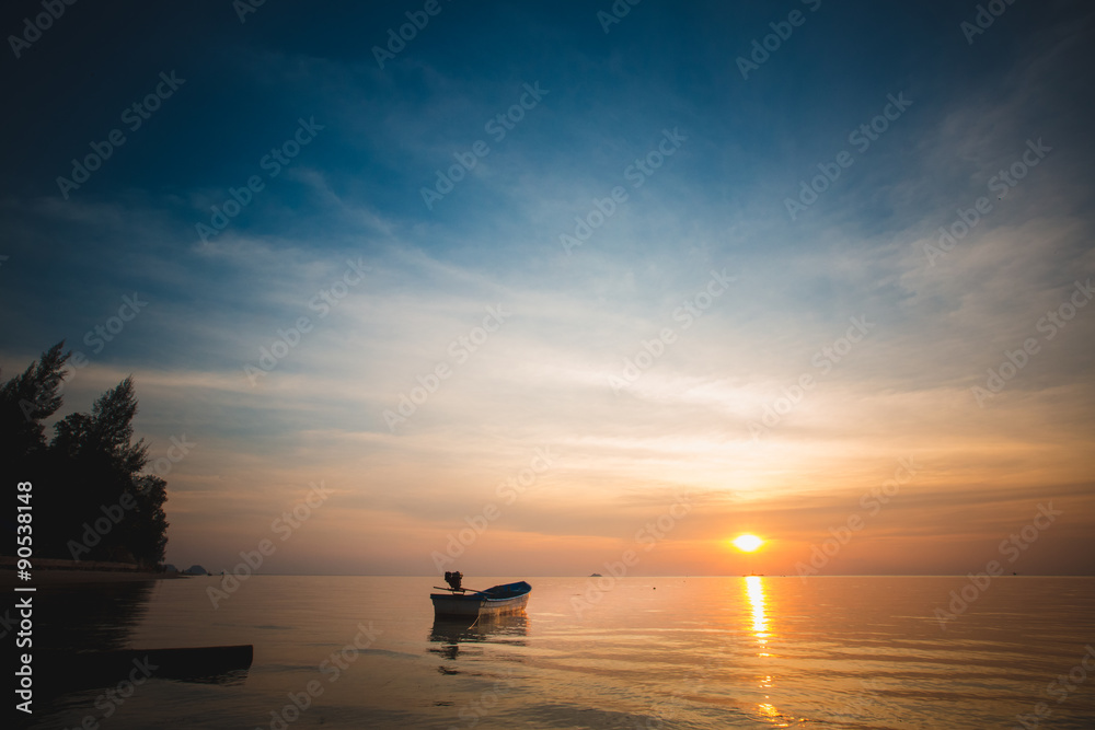 Sunset over the tropical beach. 