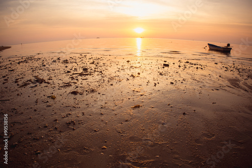 Sunset over the tropical beach. 