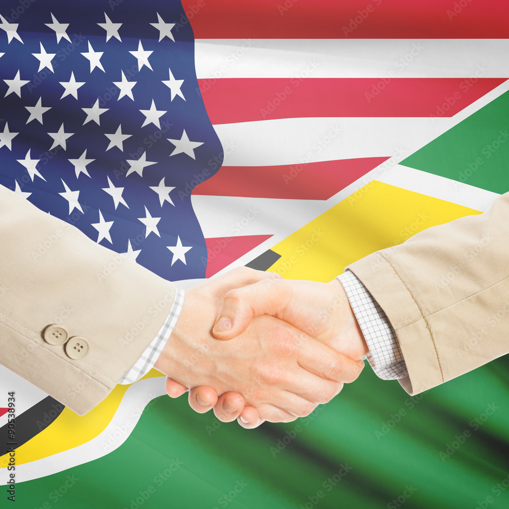 Businessmen handshake - United States and Guyana