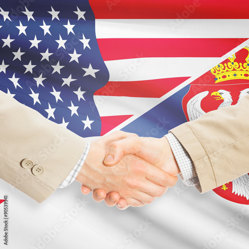 Businessmen handshake - United States and Serbia