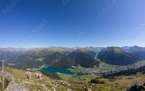View From Mt. Weissfluhjoch Down To Davos & Lake Davos In Graubünden Switzerland In Summer