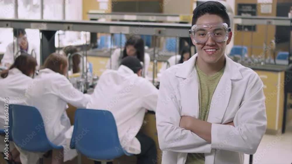 Portrait of a student in a science lab wearing safety goggles and smiling
Portrait of a student in a science lab wearing safety goggles and smiling