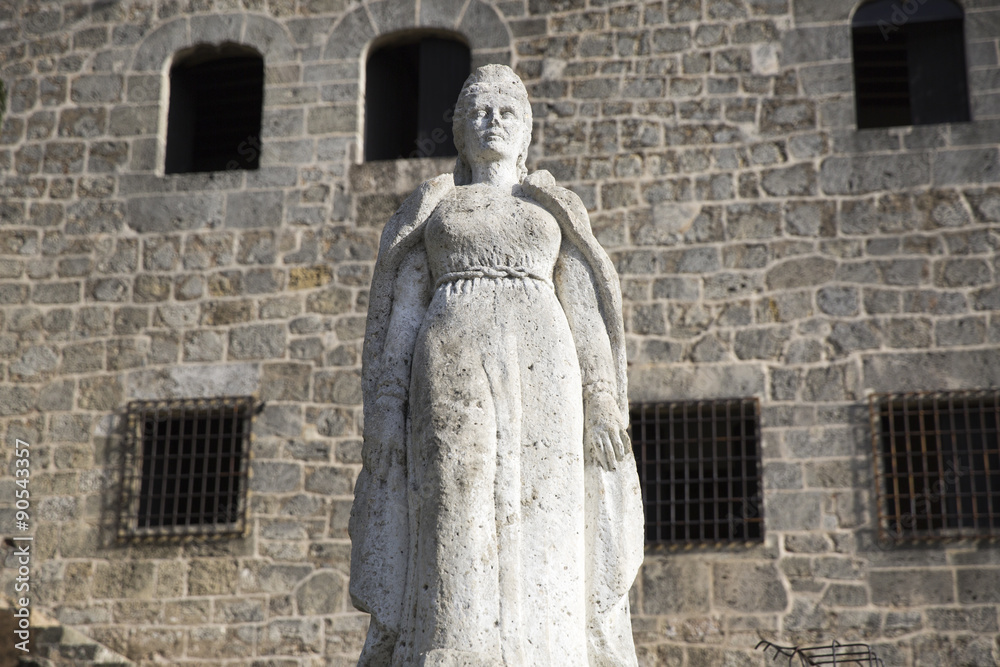 Maria de Toledo statue in Plaza de Espana from Alcazar de Colon (Palacio de Diego Colon). Santo Maria de Toledo statue in Plaza de Espana from Alcazar de Colon (Palacio de Diego Colon). Santo