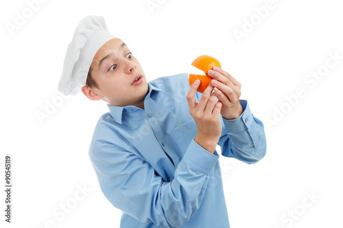 Portrait of teen Cook. On white background.