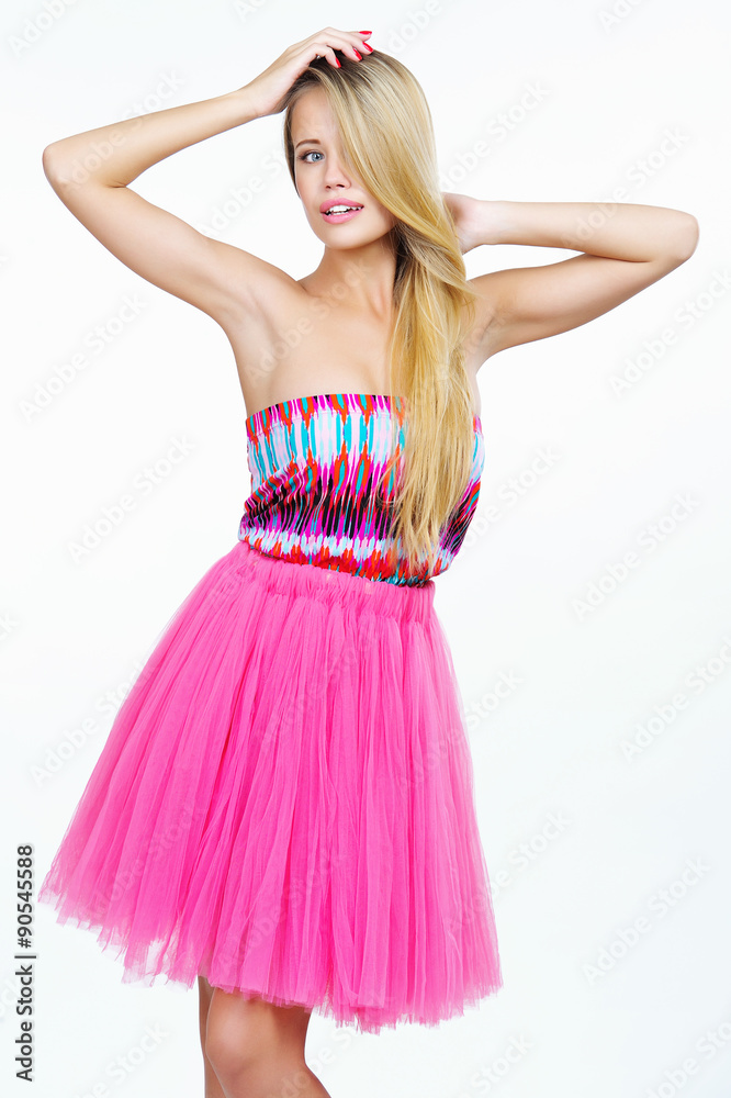 Gorgeous young woman with long healthy blonde hair posing isolated on white Gorgeous young woman with long healthy blonde hair posing isolated on white