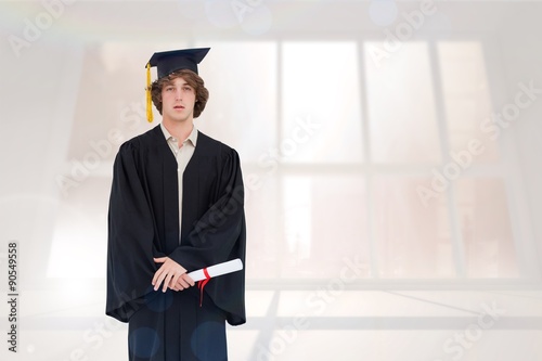 Composite image of student in graduate robe