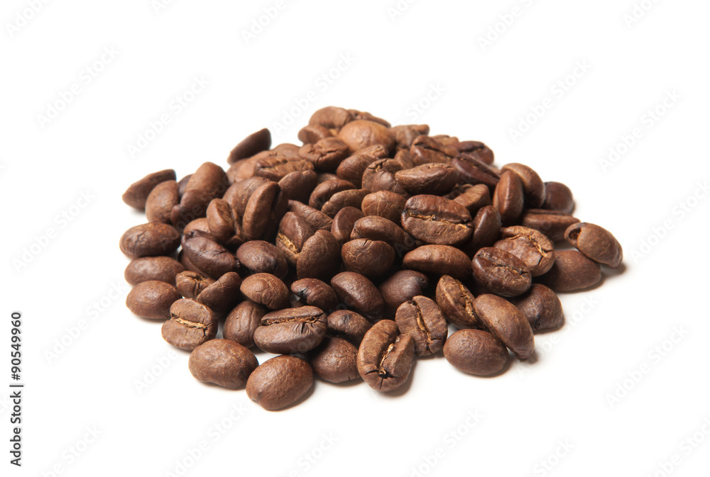 heap of roasted coffee beans on white heap of roasted coffee beans on white