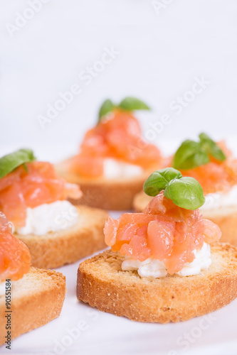 Canapes with smoked salmon and cottage cheese.