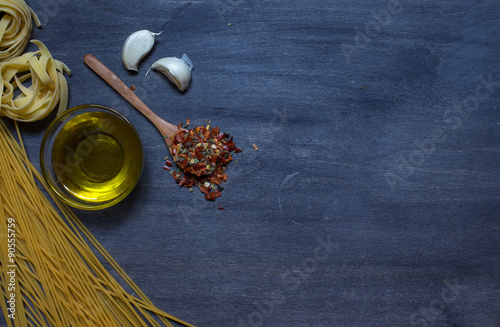 Pasta with olive oil and condiment photo