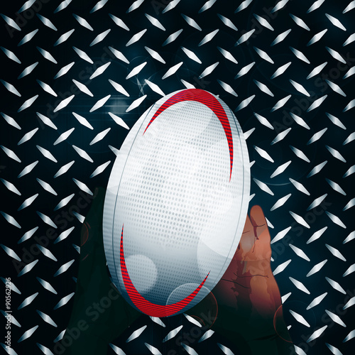 Rugby ball and hands over metal
